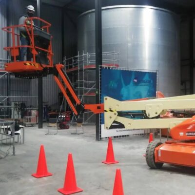 Orange JBL boom lift working